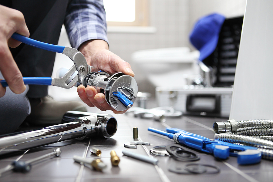 Hands Plumber At Work In A Bathroom, Plumbing Repair Service, As